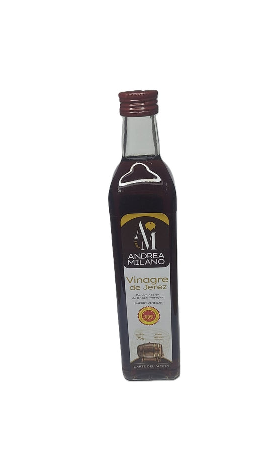 Bottle of Andrea Milano vinegar on a white background
